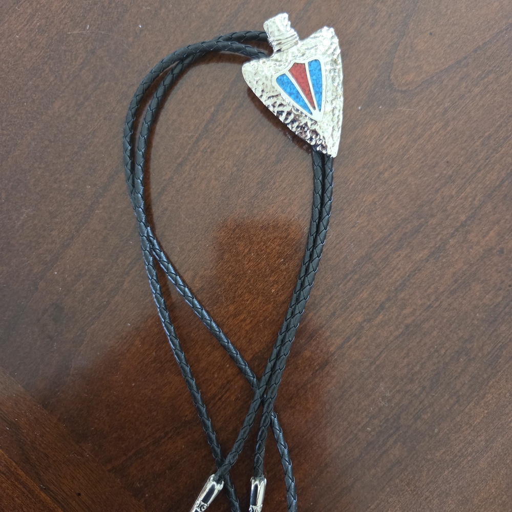 Silver Arrowhead Bolo Tie with Red and Blue Inlay